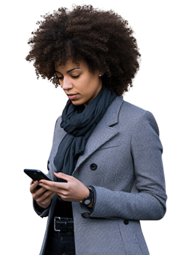 A young woman with curly hair, wearing a gray coat and black scarf, focused on her smartphone. she stands against a transparent background.